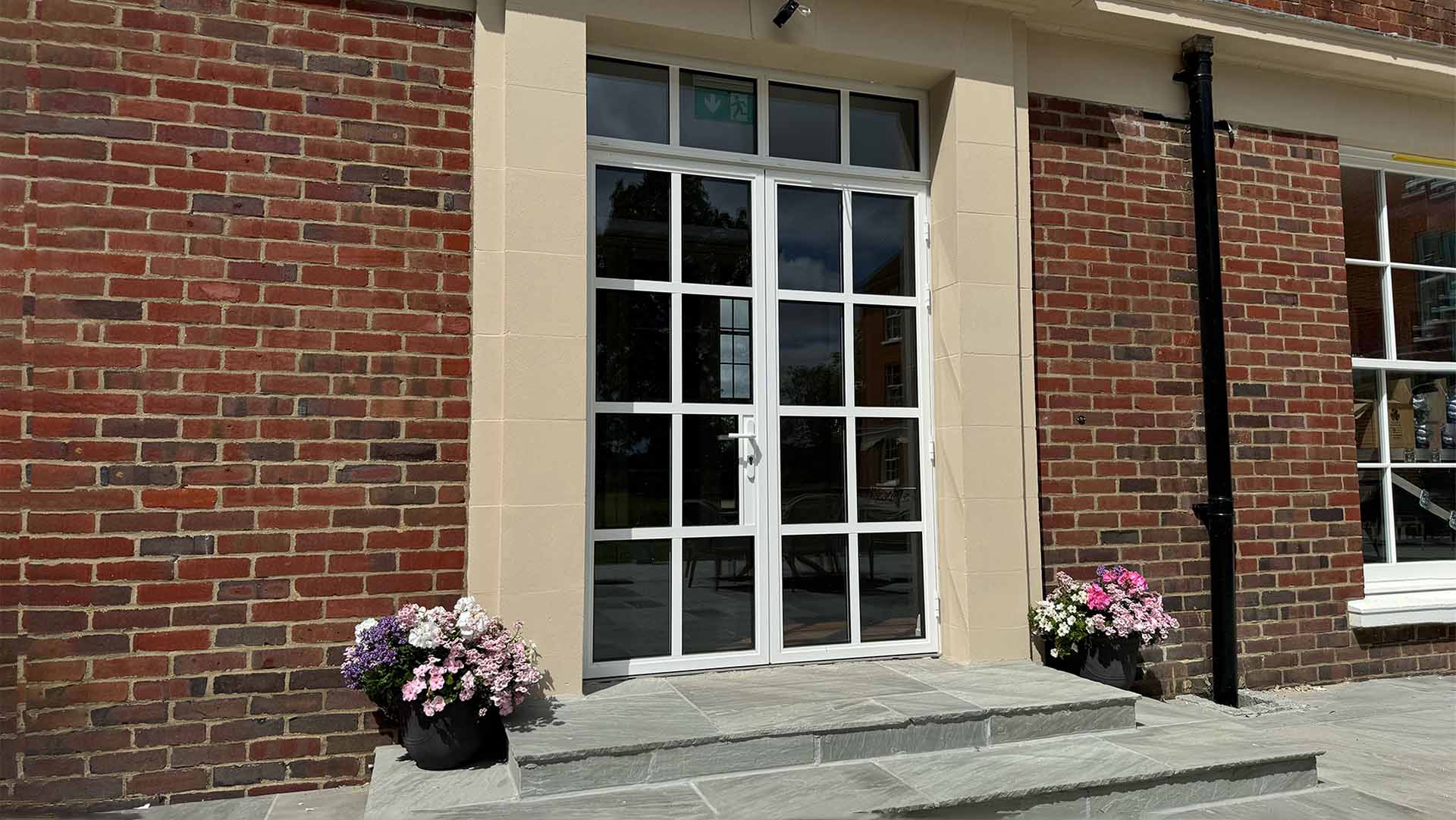 66792855d5d1f1cd497a0551 White Heritage french door on public building